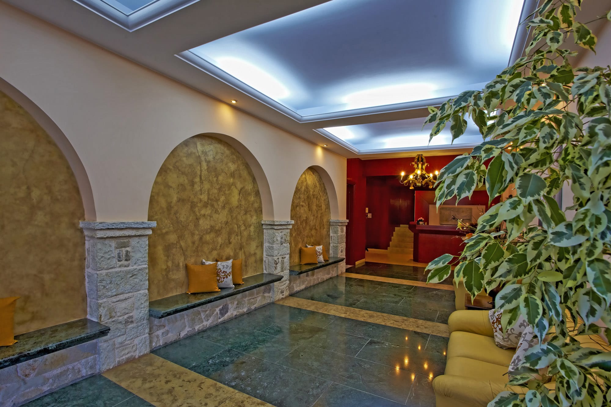 a room with a pool and a fireplace