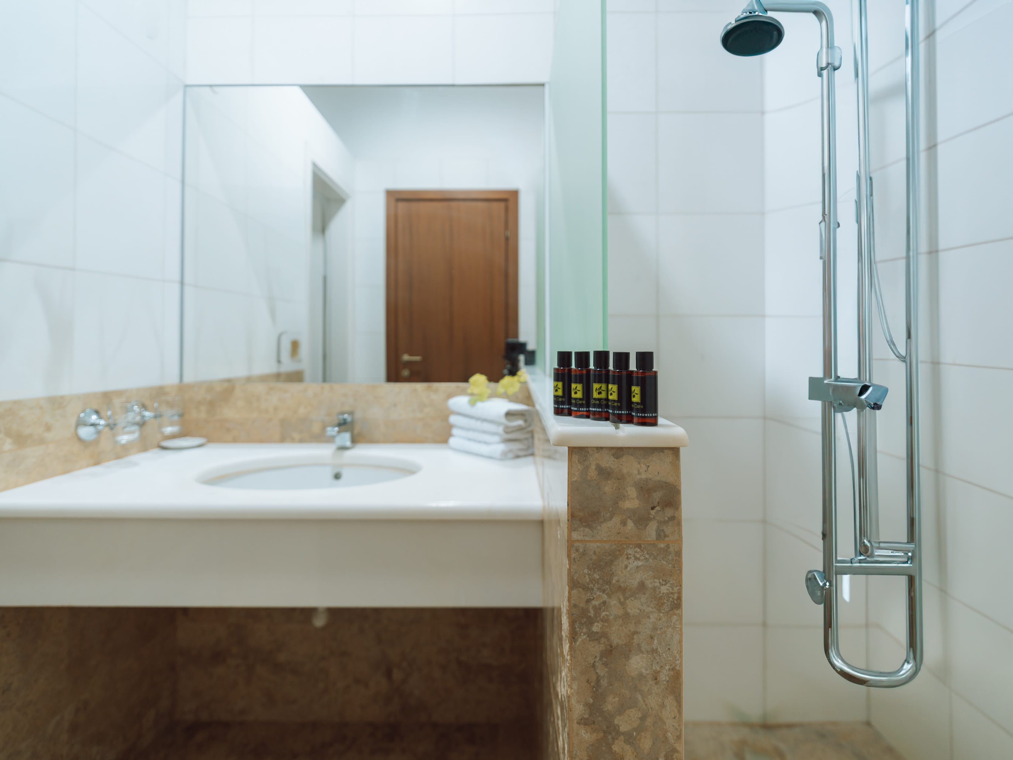 a bathroom with a glass shower