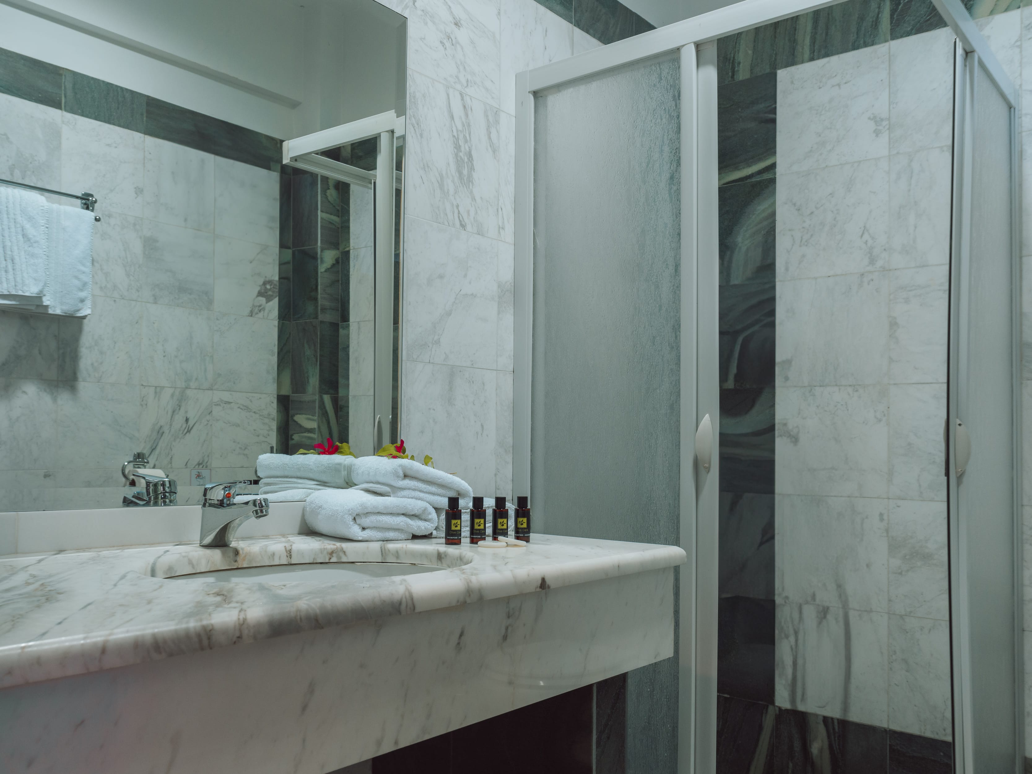 a bathroom with a large mirror