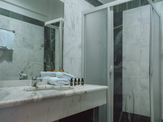 a bathroom with a large mirror