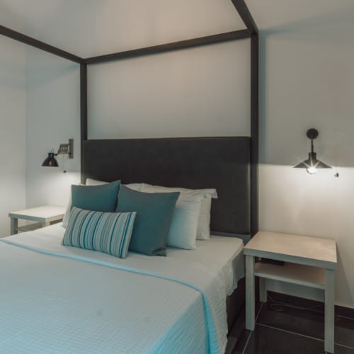 a bed with pillows