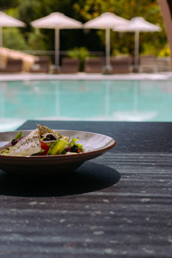a plate of salad on a table