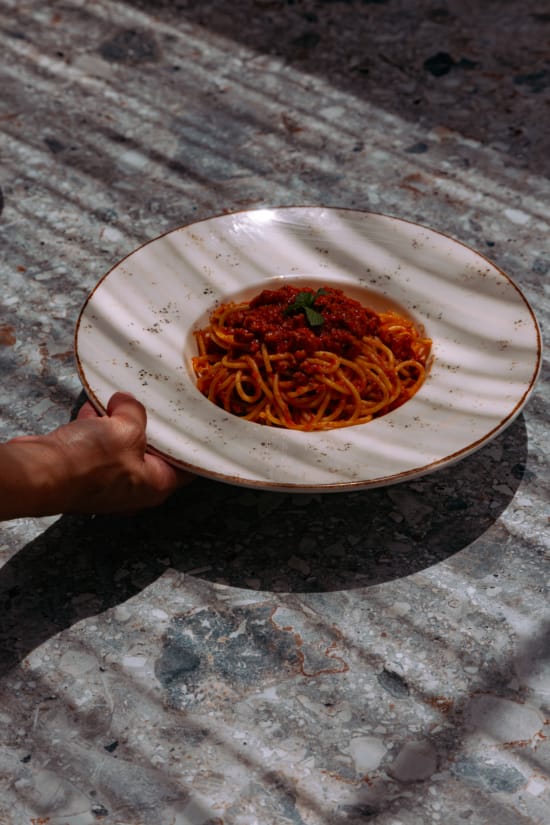 a plate of spaghetti with sauce