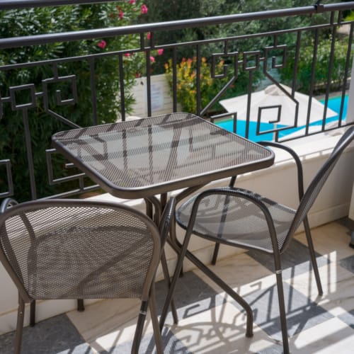 a table and chairs on a patio