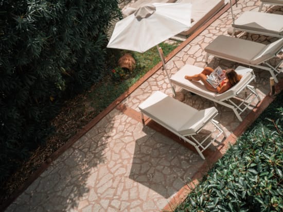 a patio with a table and chairs