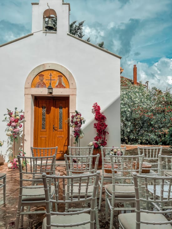 a patio with chairs and tables outside