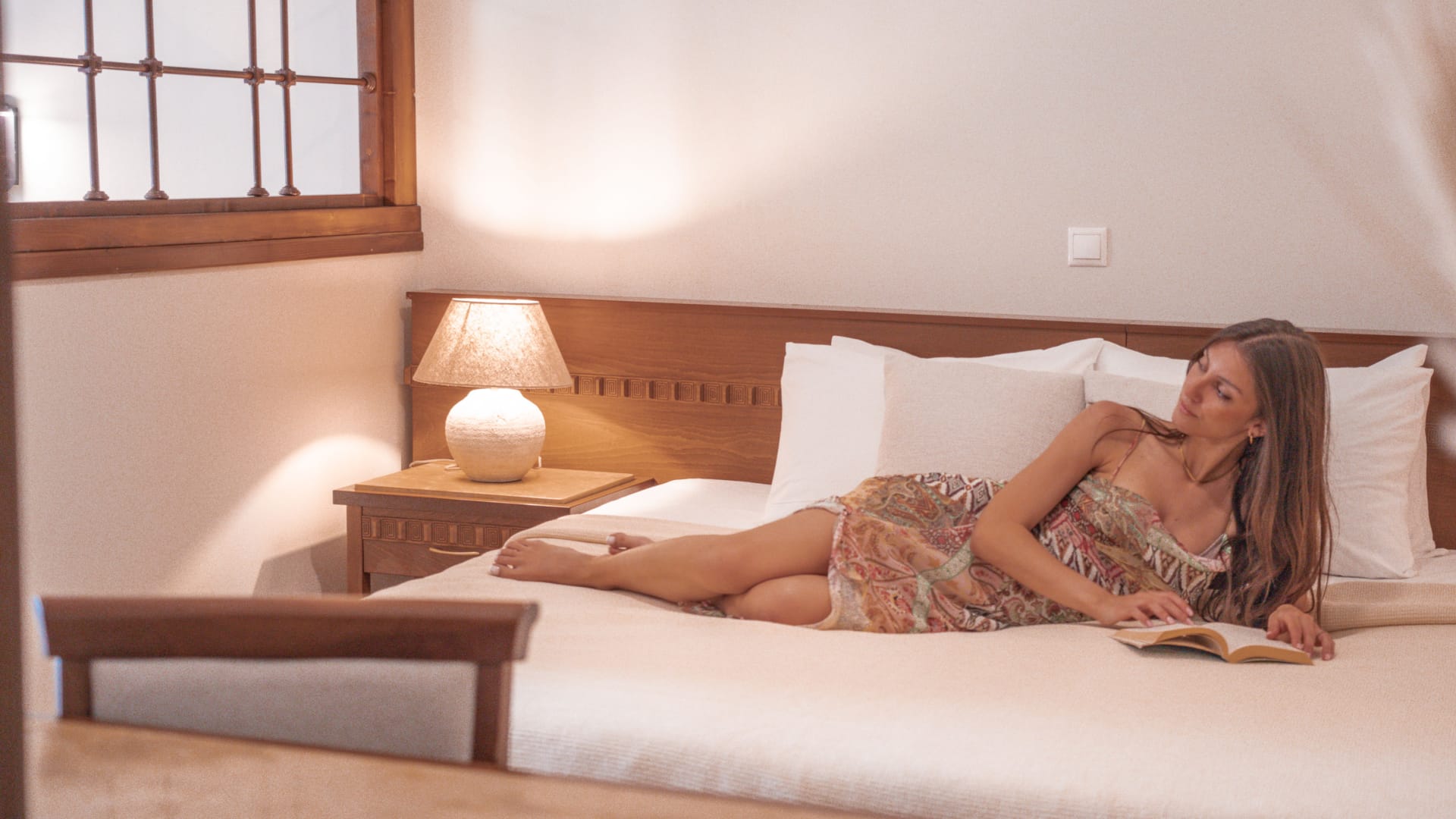 a person laying on a bed