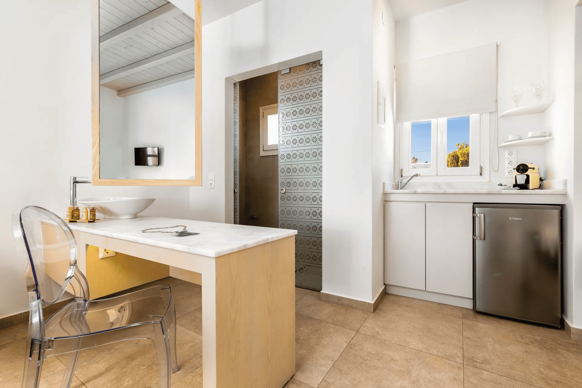 a kitchen with white cabinets