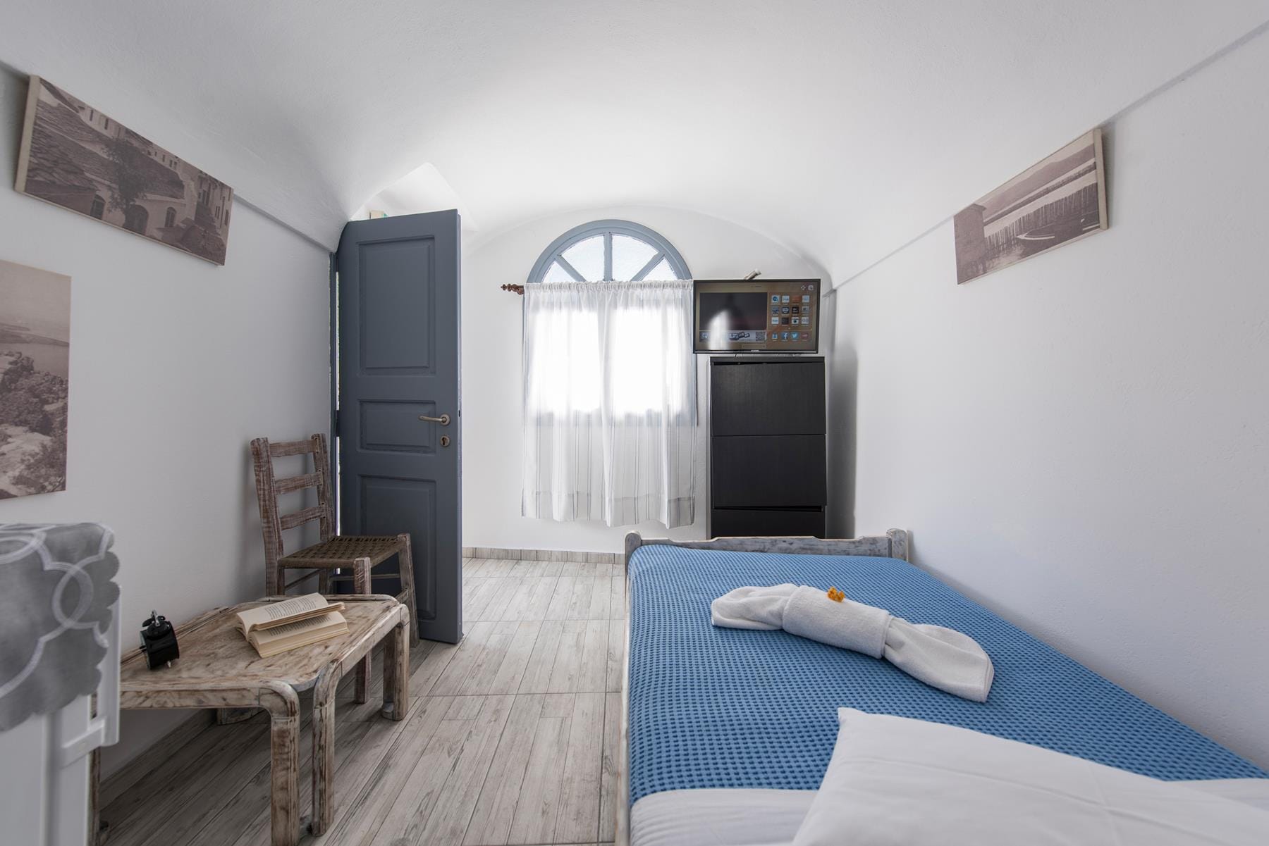 a room with a bed and a table