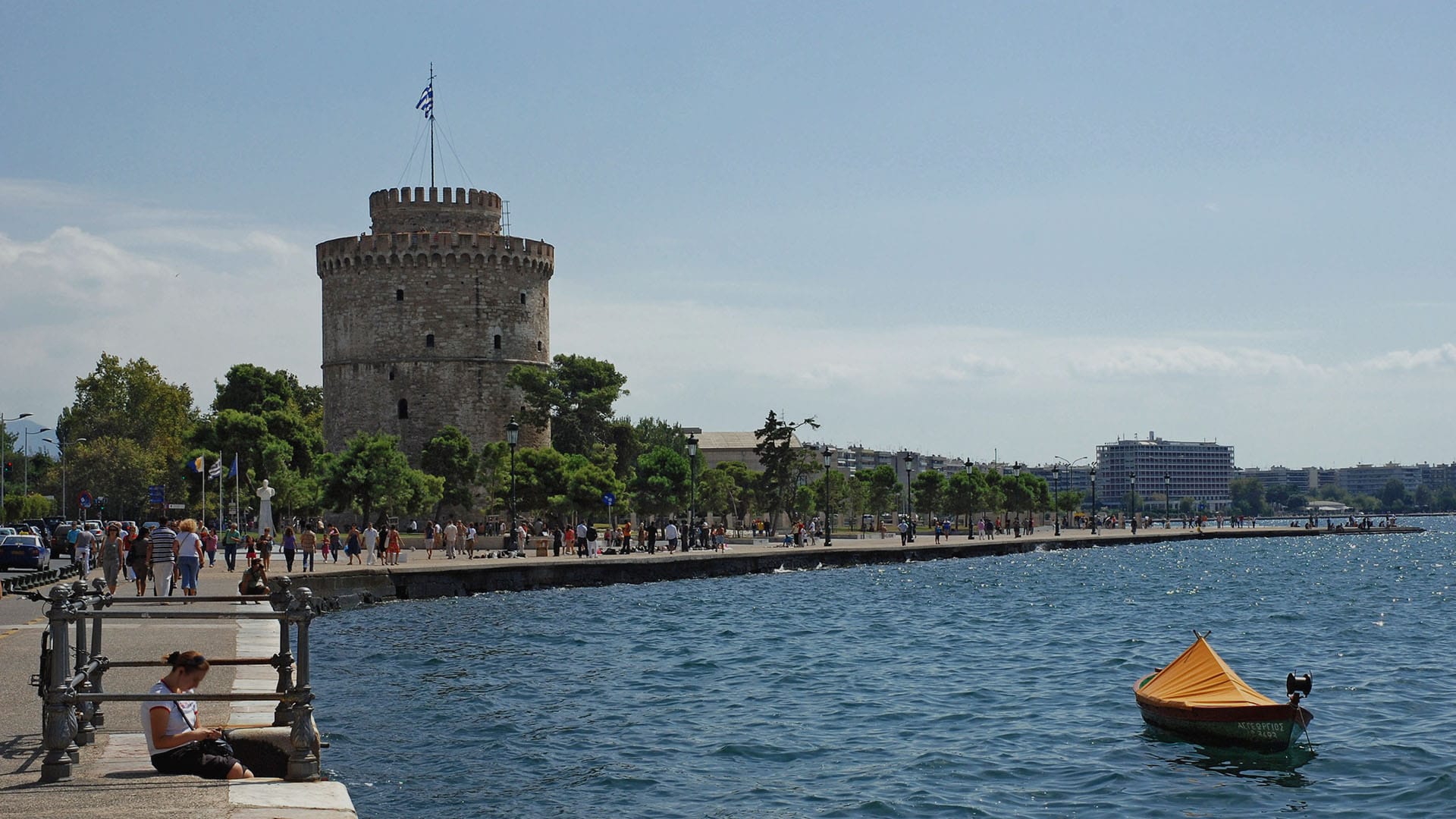 a large building next to a body of water