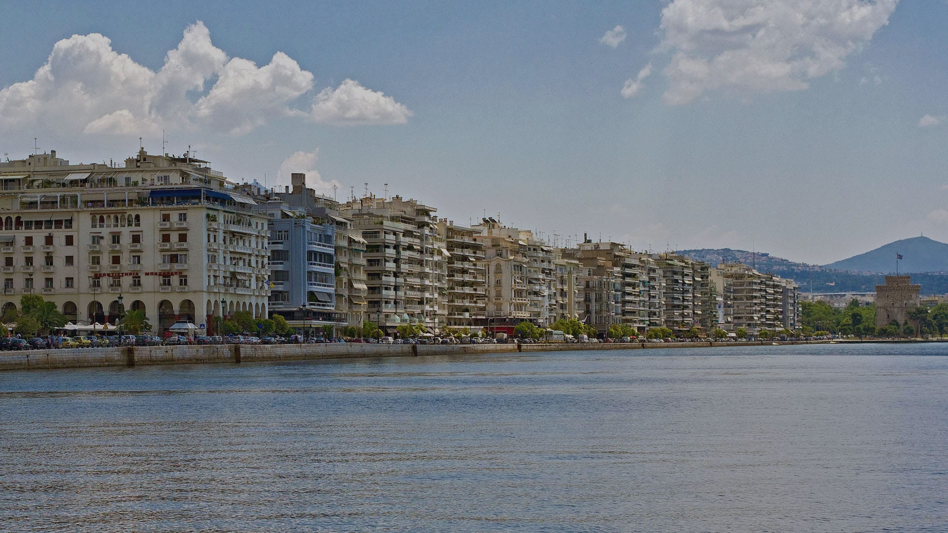 a body of water with buildings along it