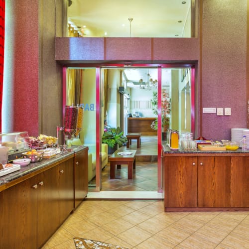 a kitchen with a large glass door