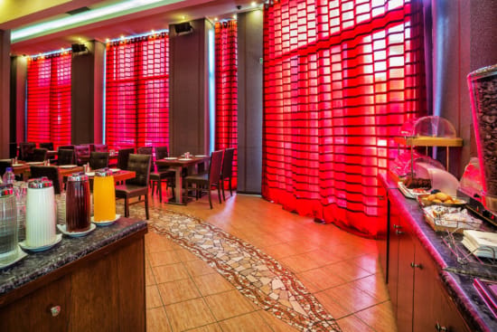 a room with red curtains