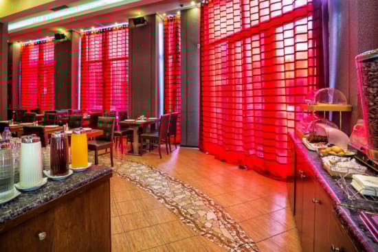 a room with red curtains