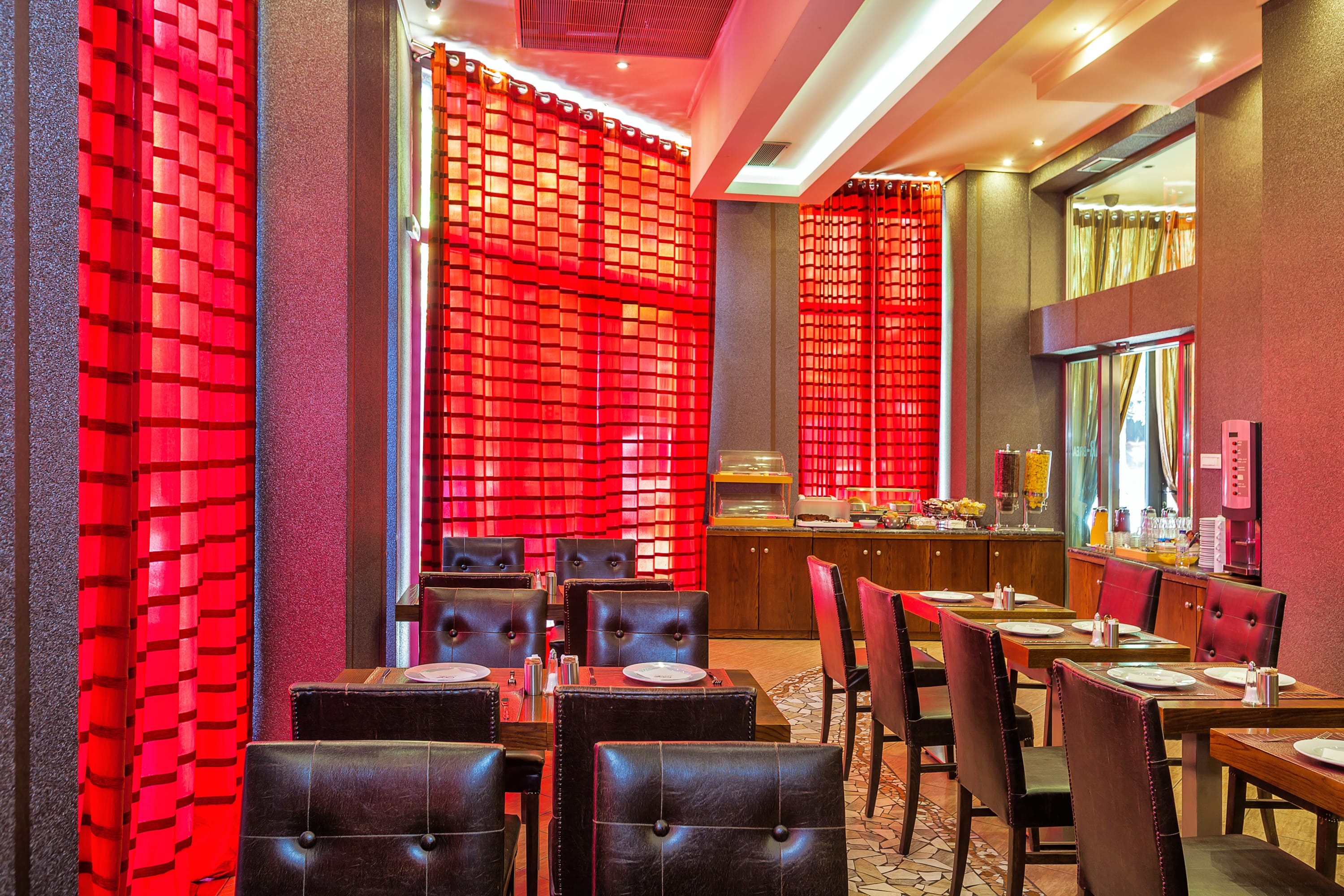 a room with tables and chairs