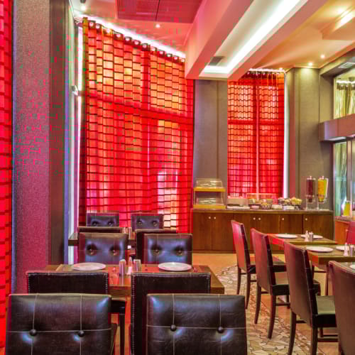 a room with tables and chairs