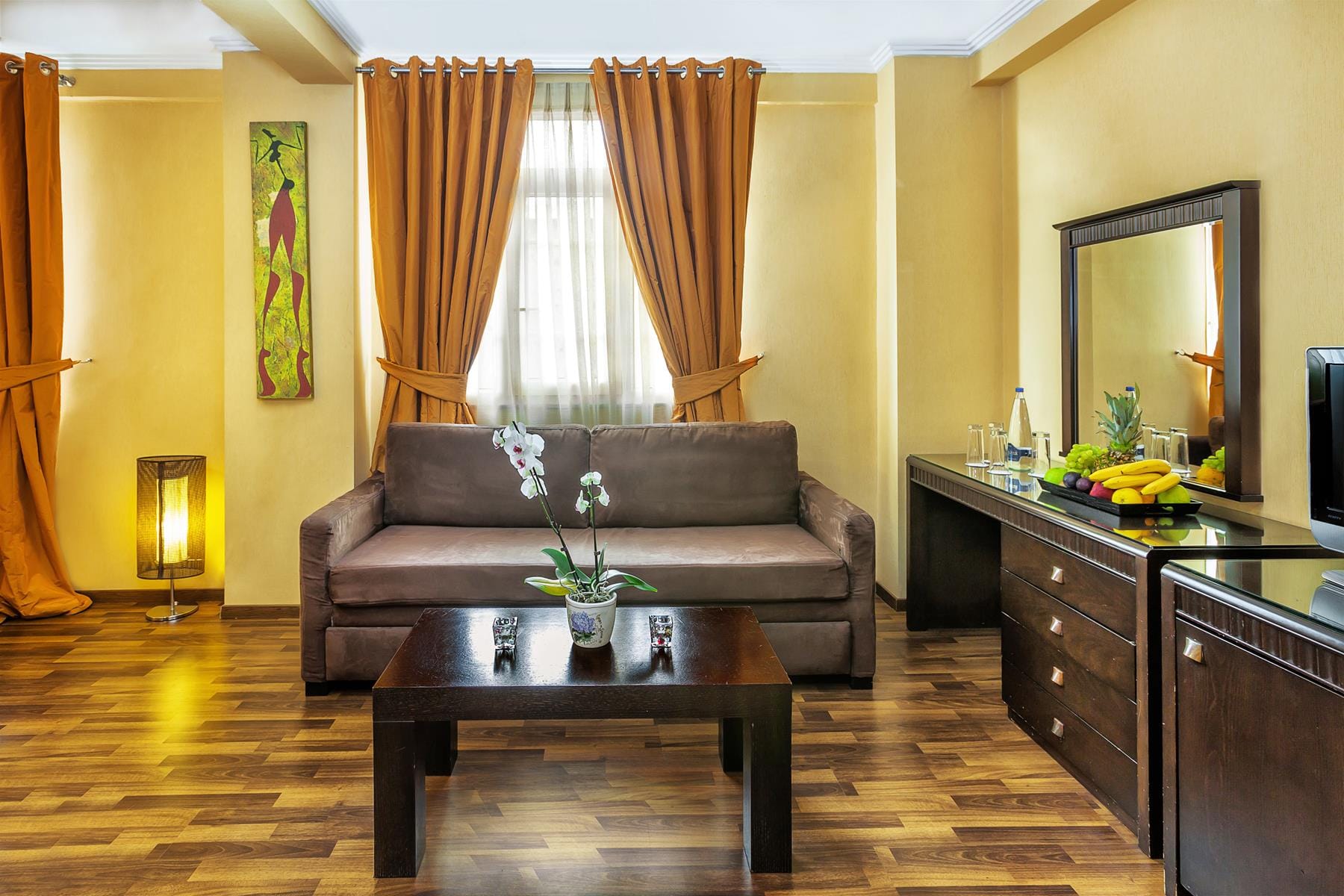 a living room with a couch and a coffee table