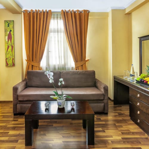 a living room with a couch and a coffee table