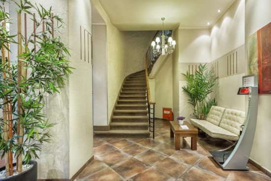 a living room with a staircase