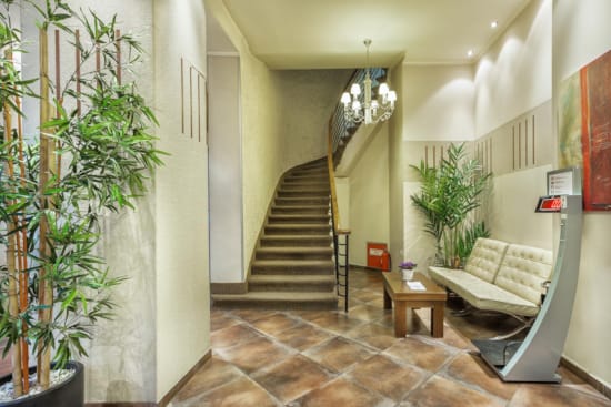 a living room with a staircase