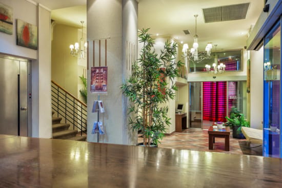 a large room with a large tree