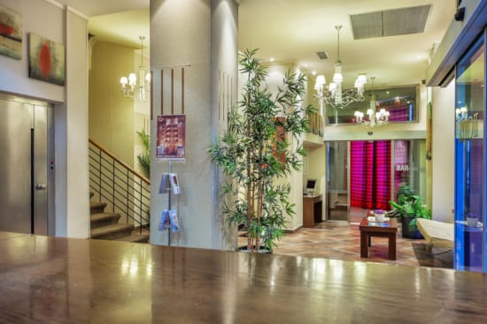 a large room with a large tree