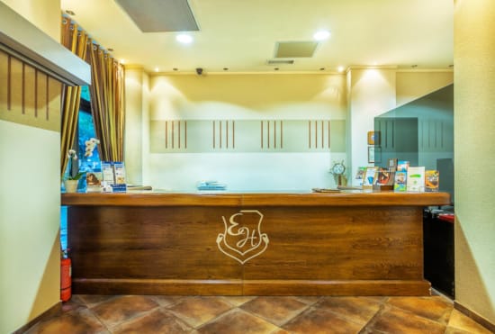 a bathroom with a large mirror