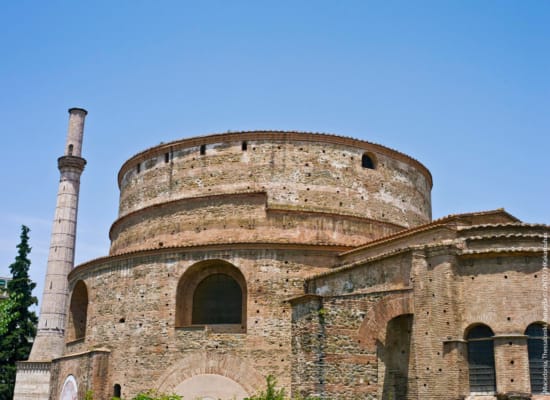 a stone building with a tall tower