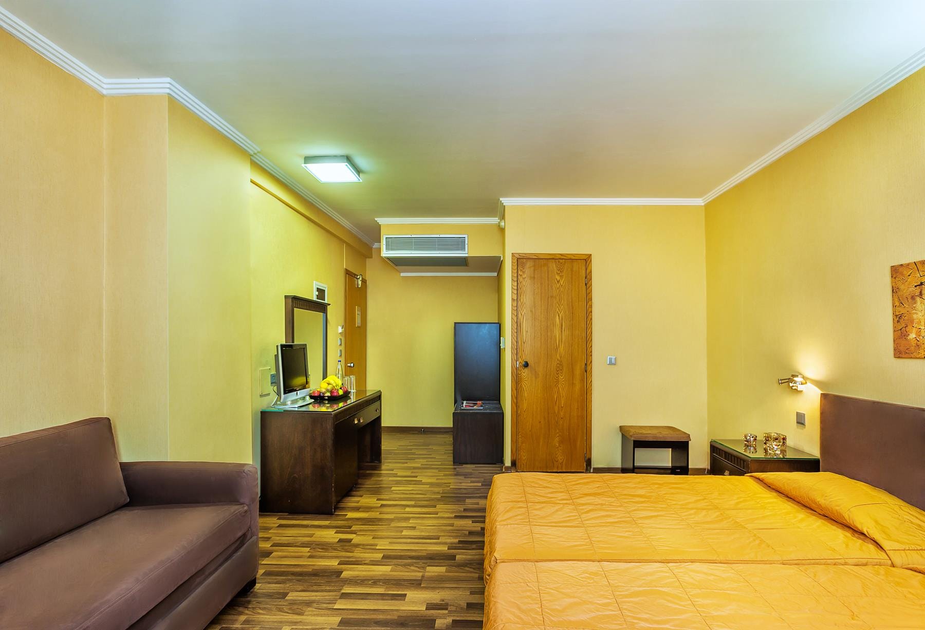 a room with a bed and a couch