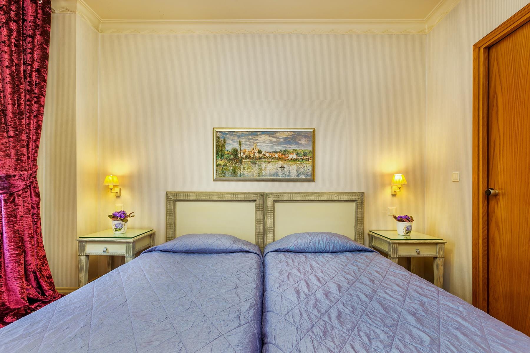 a bedroom with two beds