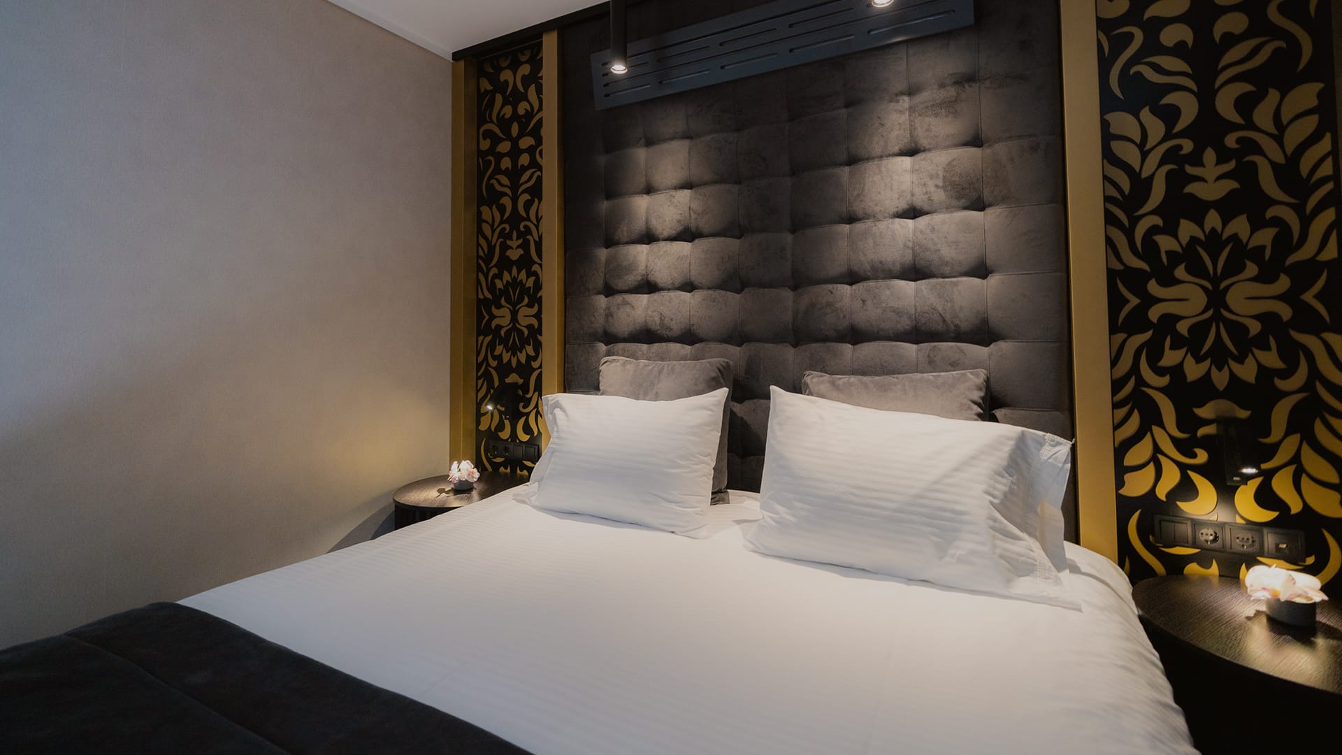 a bed with white sheets