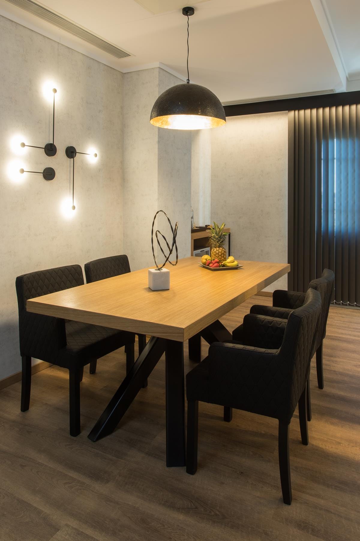 a dining table with chairs around it