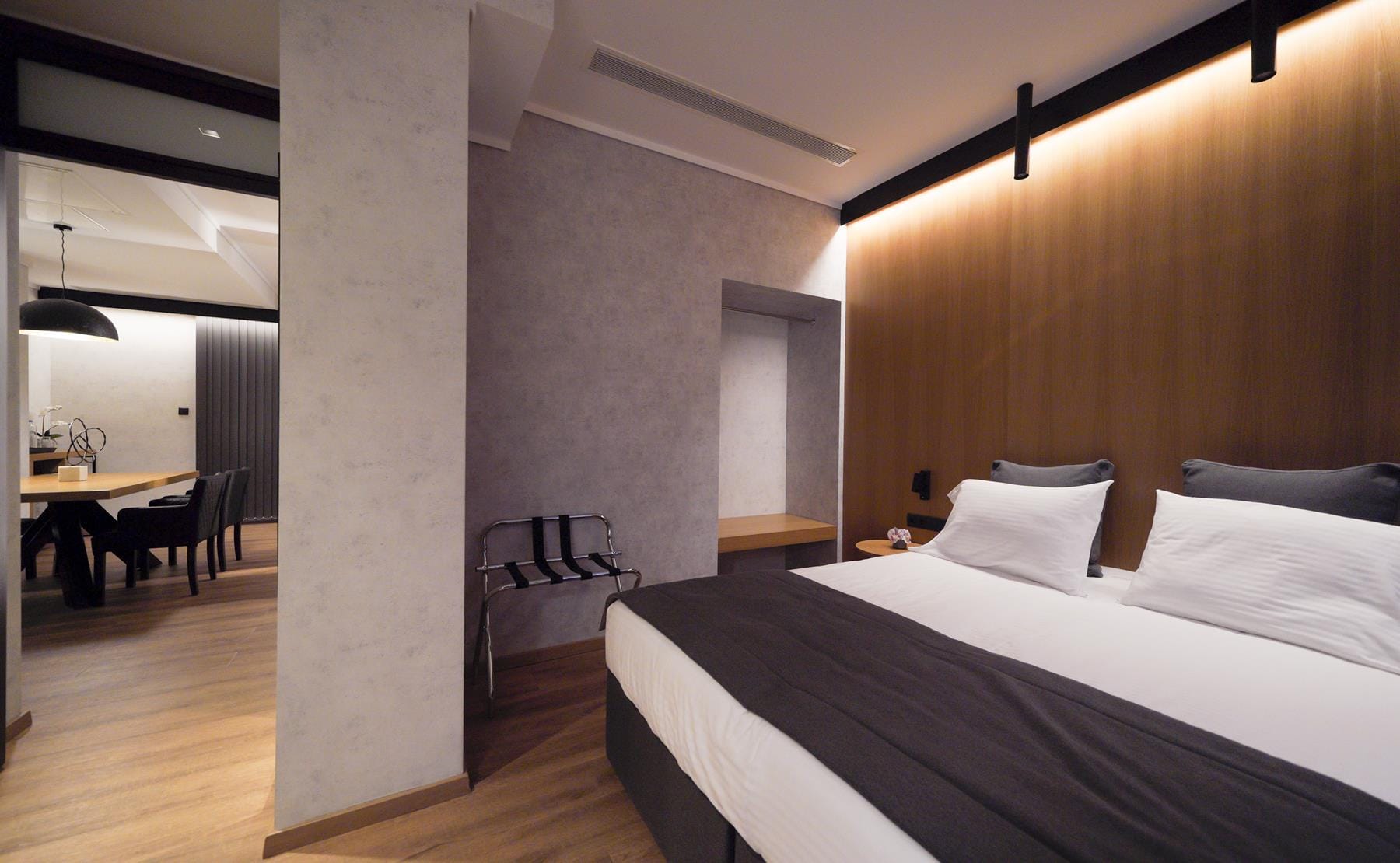 a room with a bed and a desk