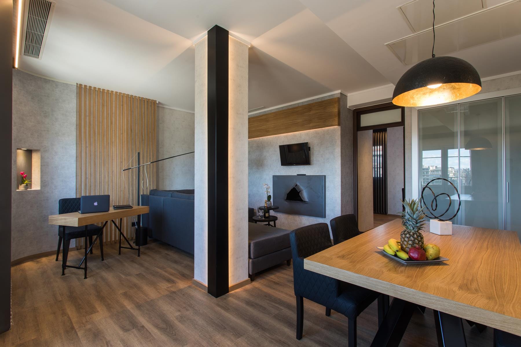 a room with a table and chairs