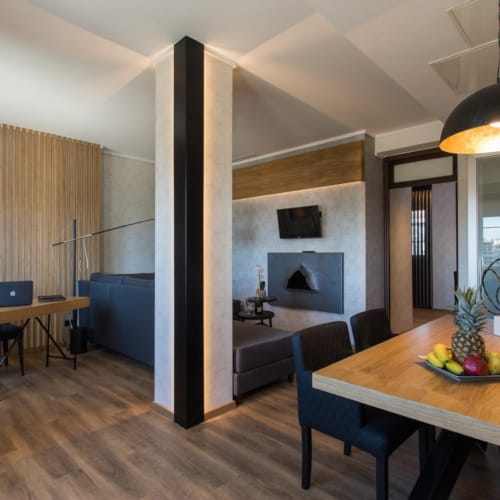 a room with a table and chairs