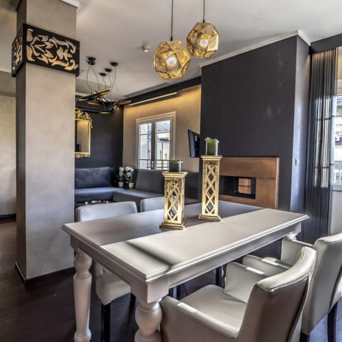 a room with a table and chairs