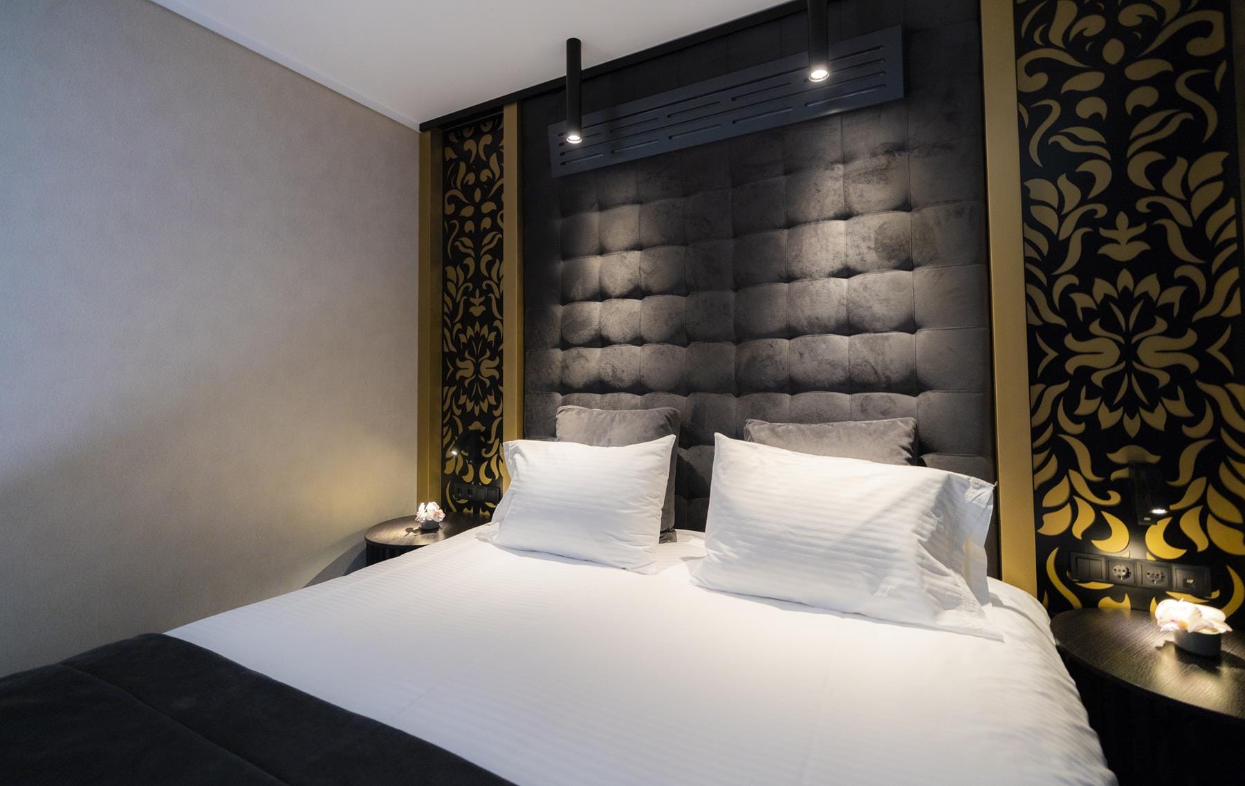 a bed with white sheets