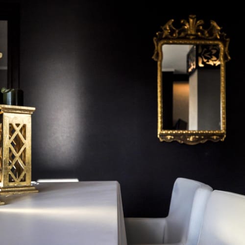 a gold and glass tower