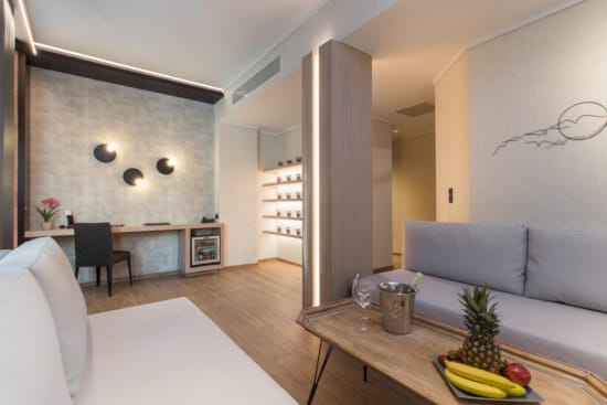 a living room with a couch and a table