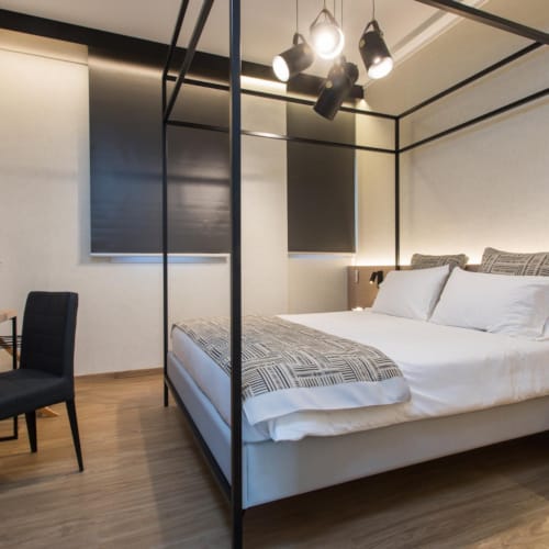 a bed with a white sheet