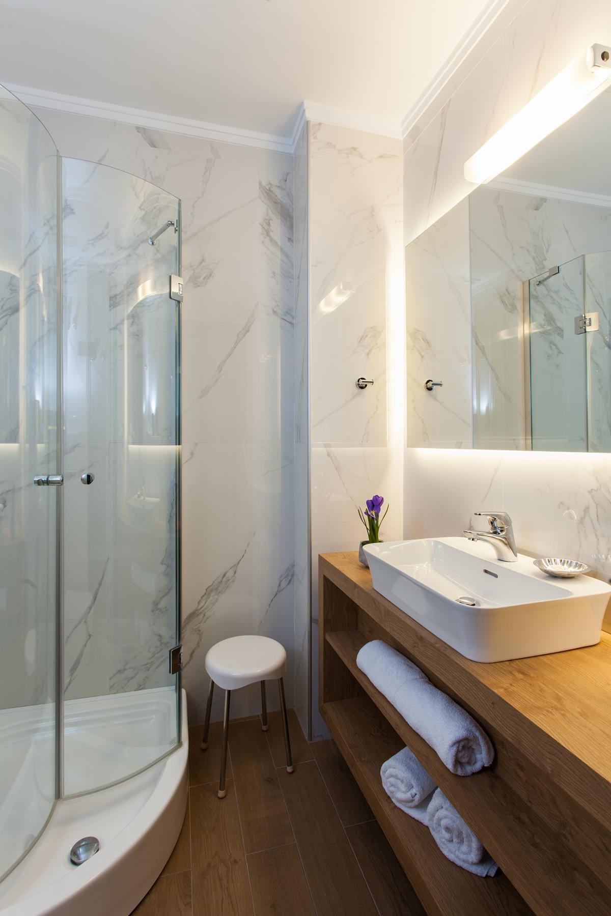 a bathroom with a glass shower