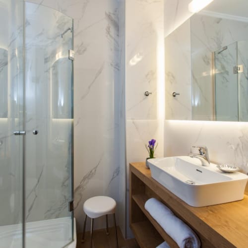 a bathroom with a glass shower