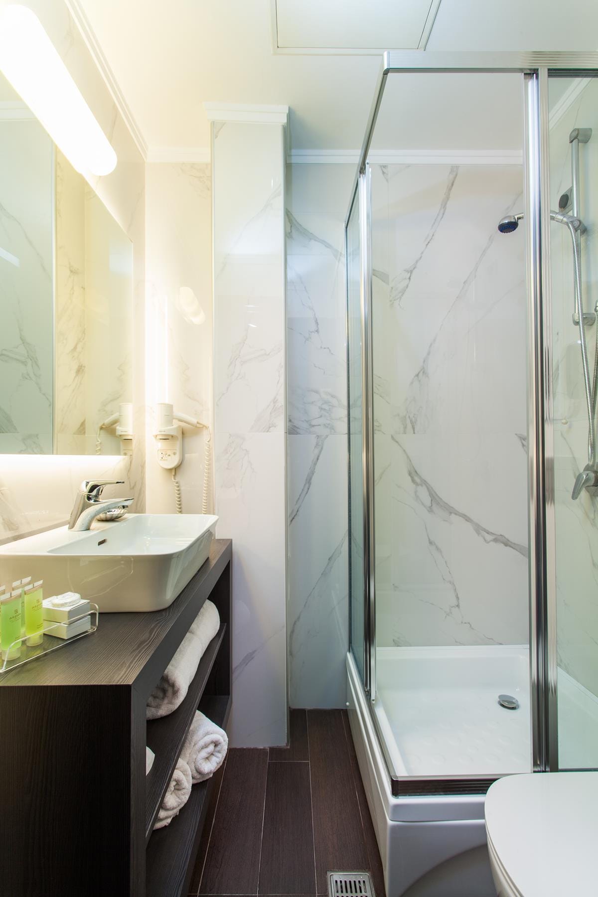 a bathroom with a glass shower