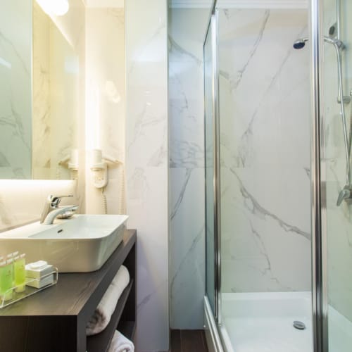 a bathroom with a glass shower