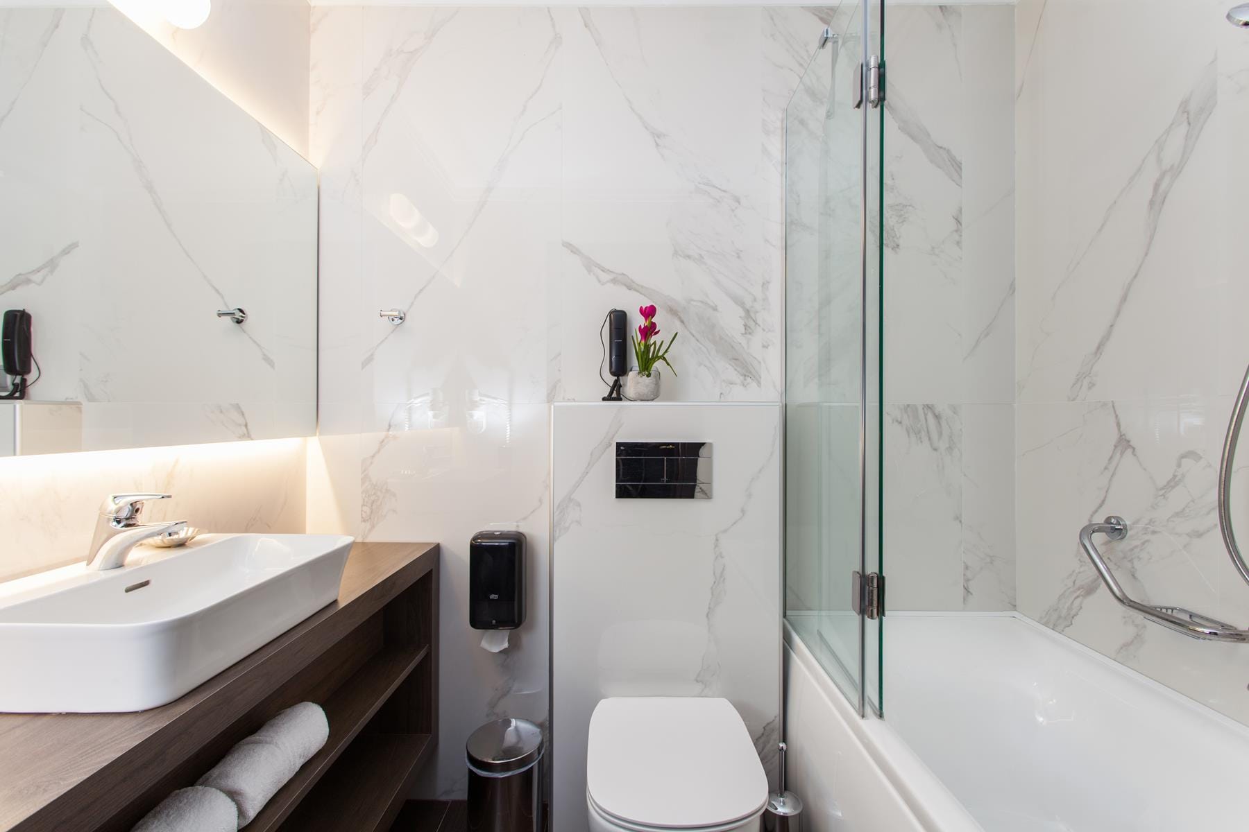 a bathroom with a glass shower