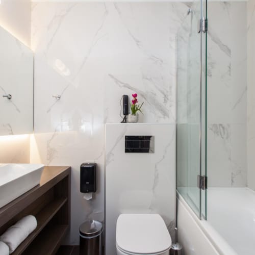 a bathroom with a glass shower