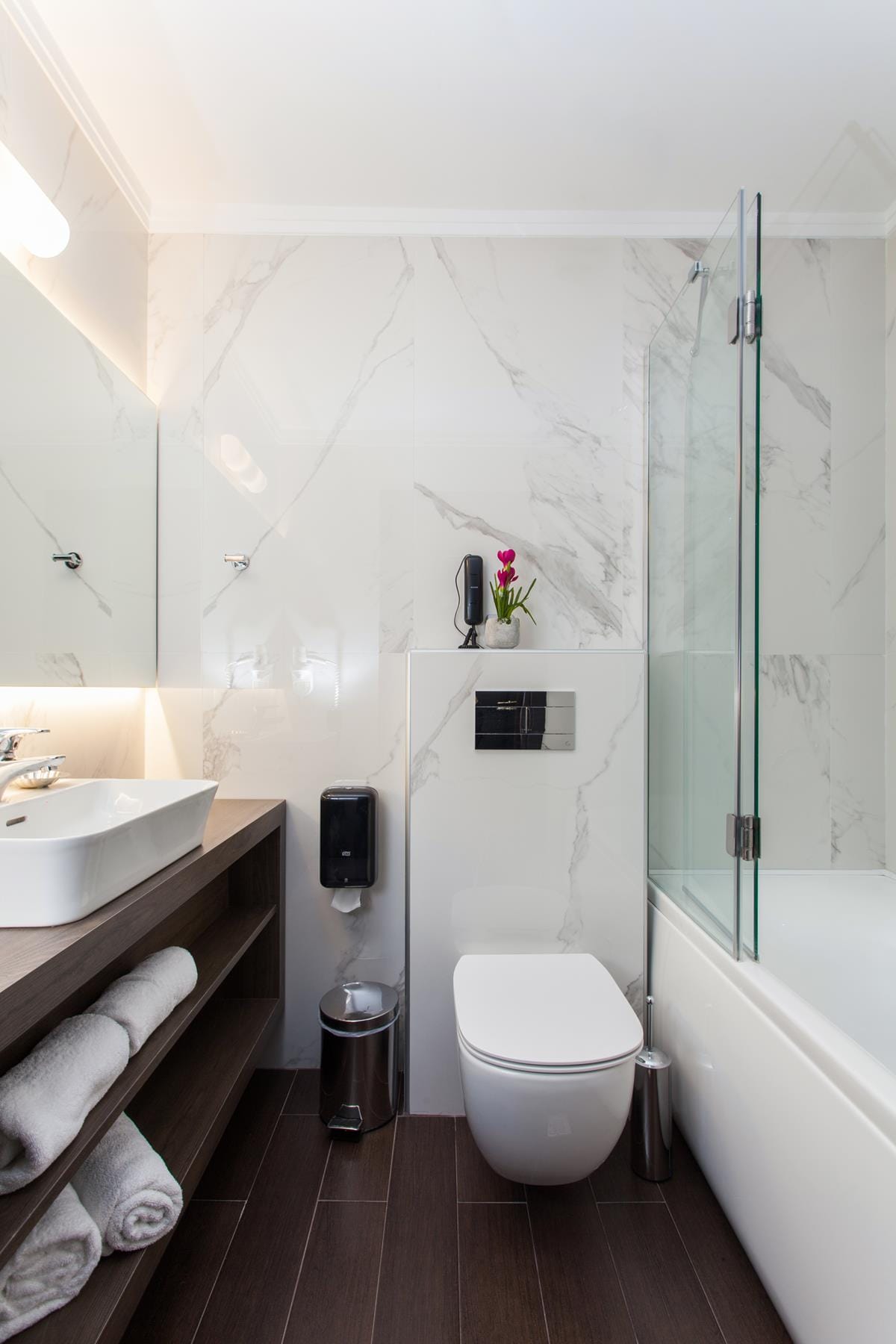 a bathroom with a toilet and sink