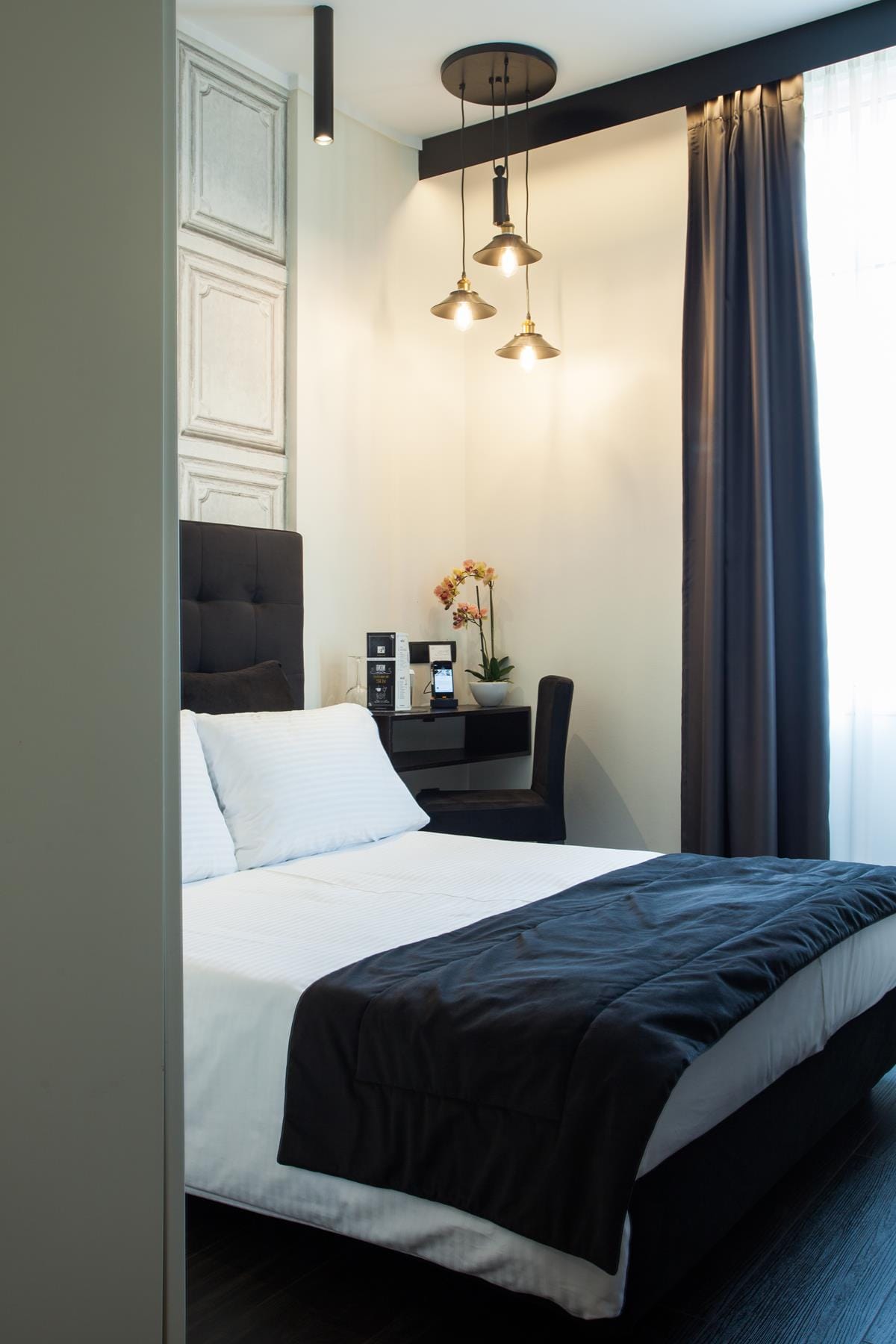 a bed with a black headboard