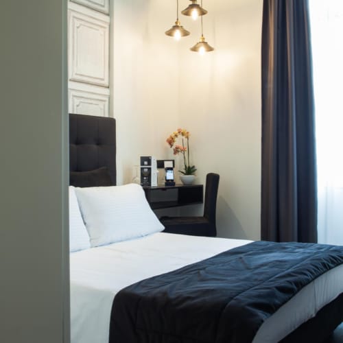 a bed with a black headboard