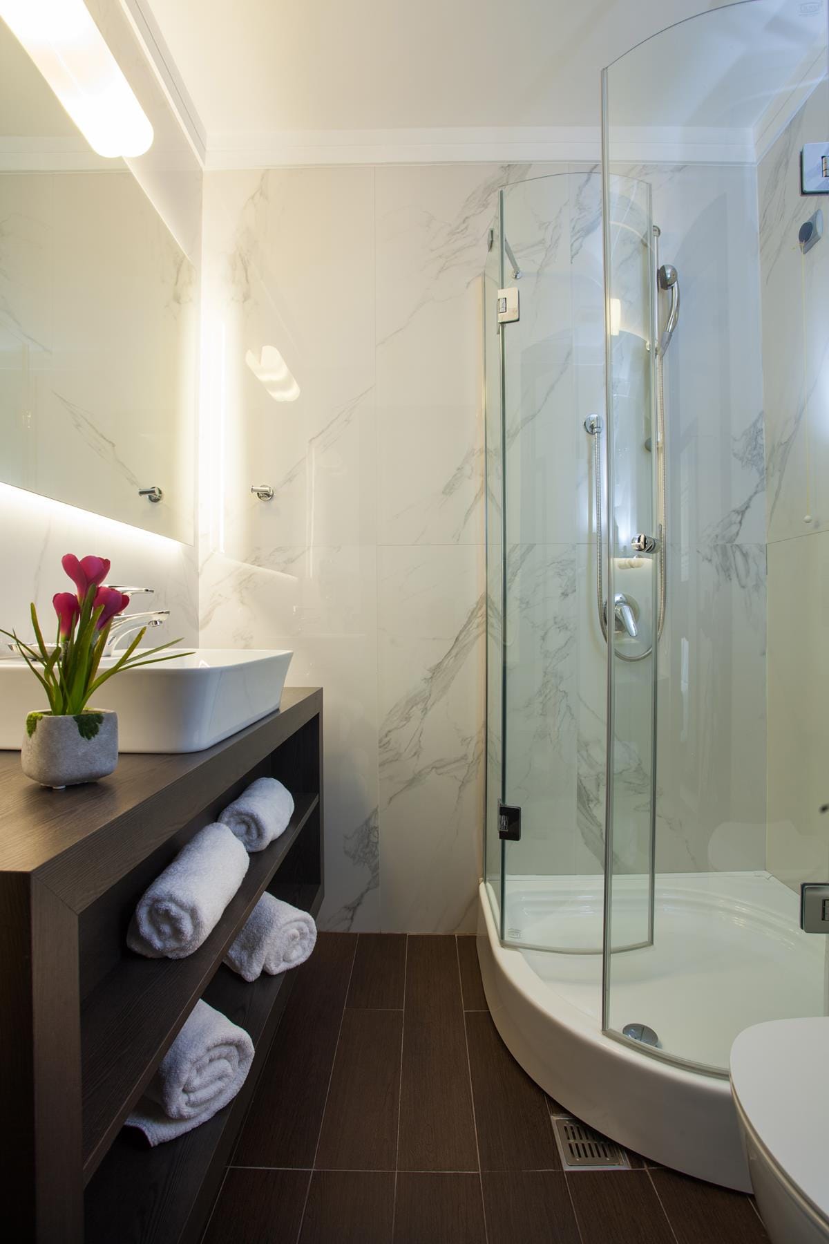 a bathroom with a glass shower